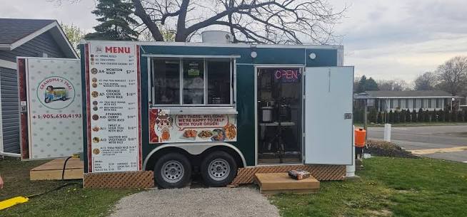 Local food trailer with full menu board